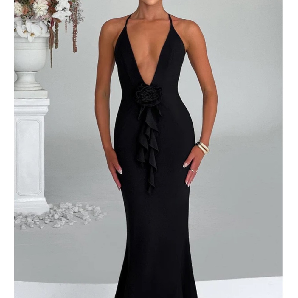 Chic Black Backless Dress with Floral Accent